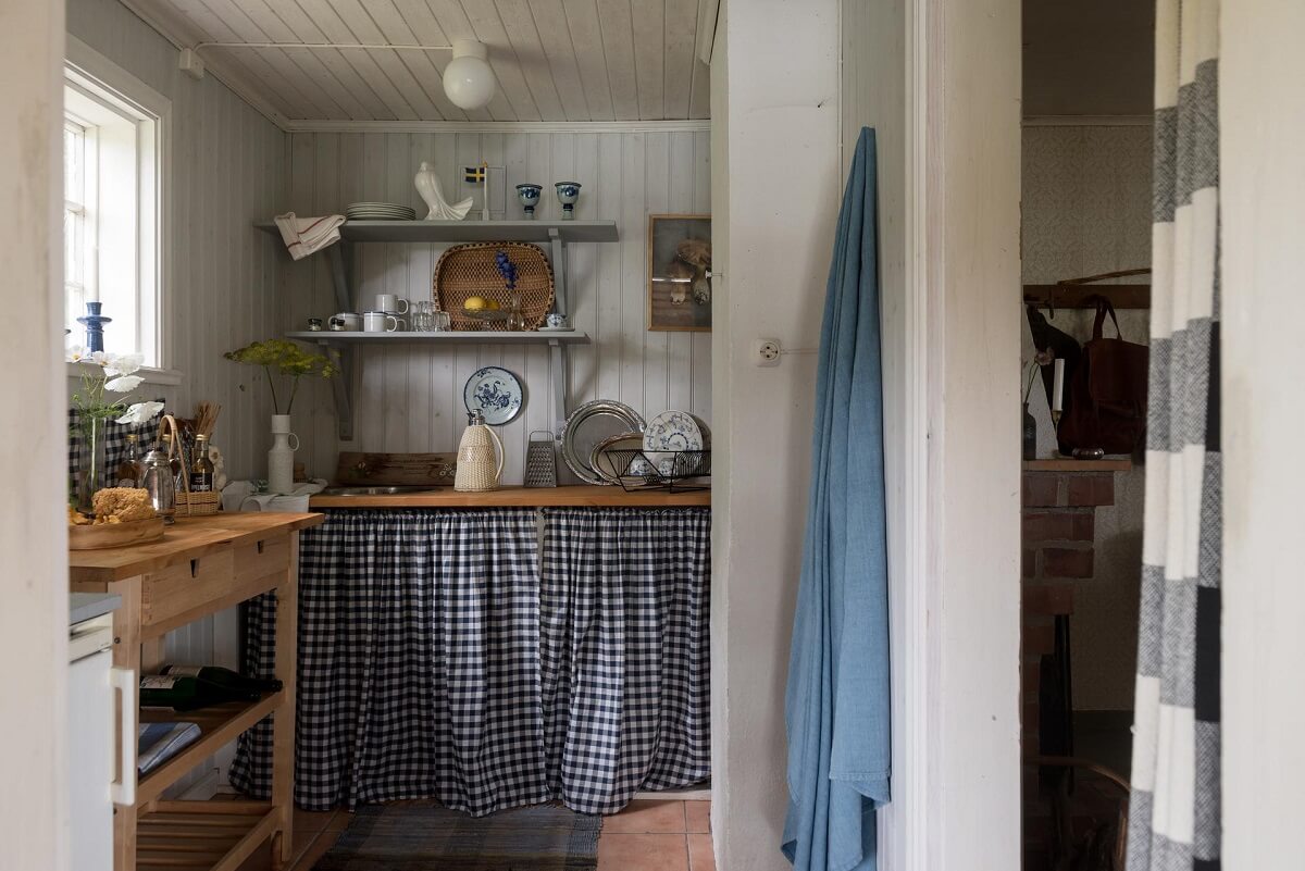 A Traditional Summer House Cabin in Sweden 7 kitchen with shelves traditional wooden summer cottage sweden nordroom