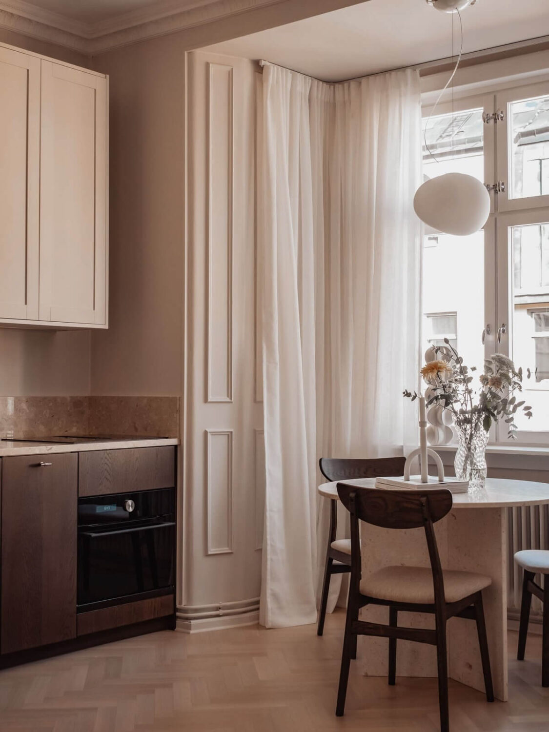 A Serene and Luxurious Apartment in Stockholm 8 kitchen with small round table