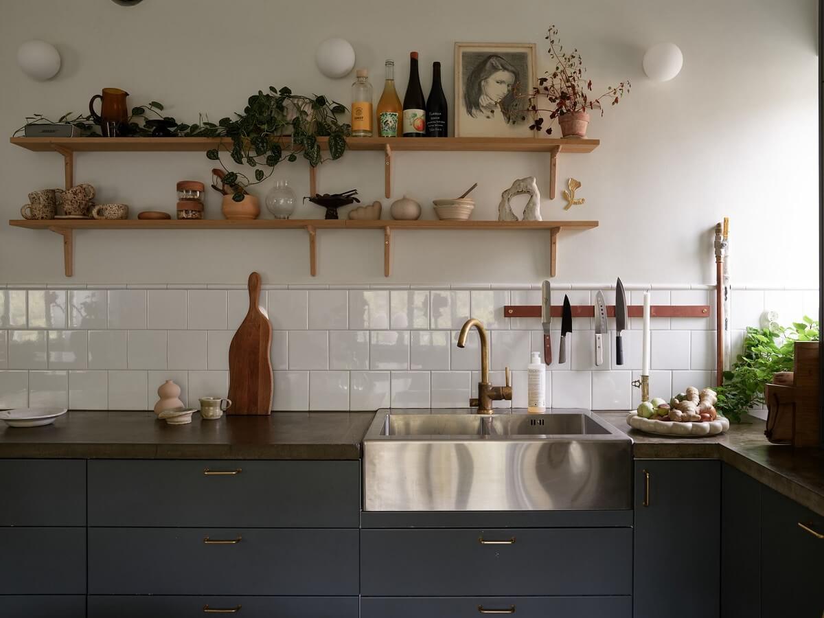 A Stunning Bathroom in a Duplex Apartment in Stockholm 12 kitchen with wooden shelves and stainless steel sink nordroom
