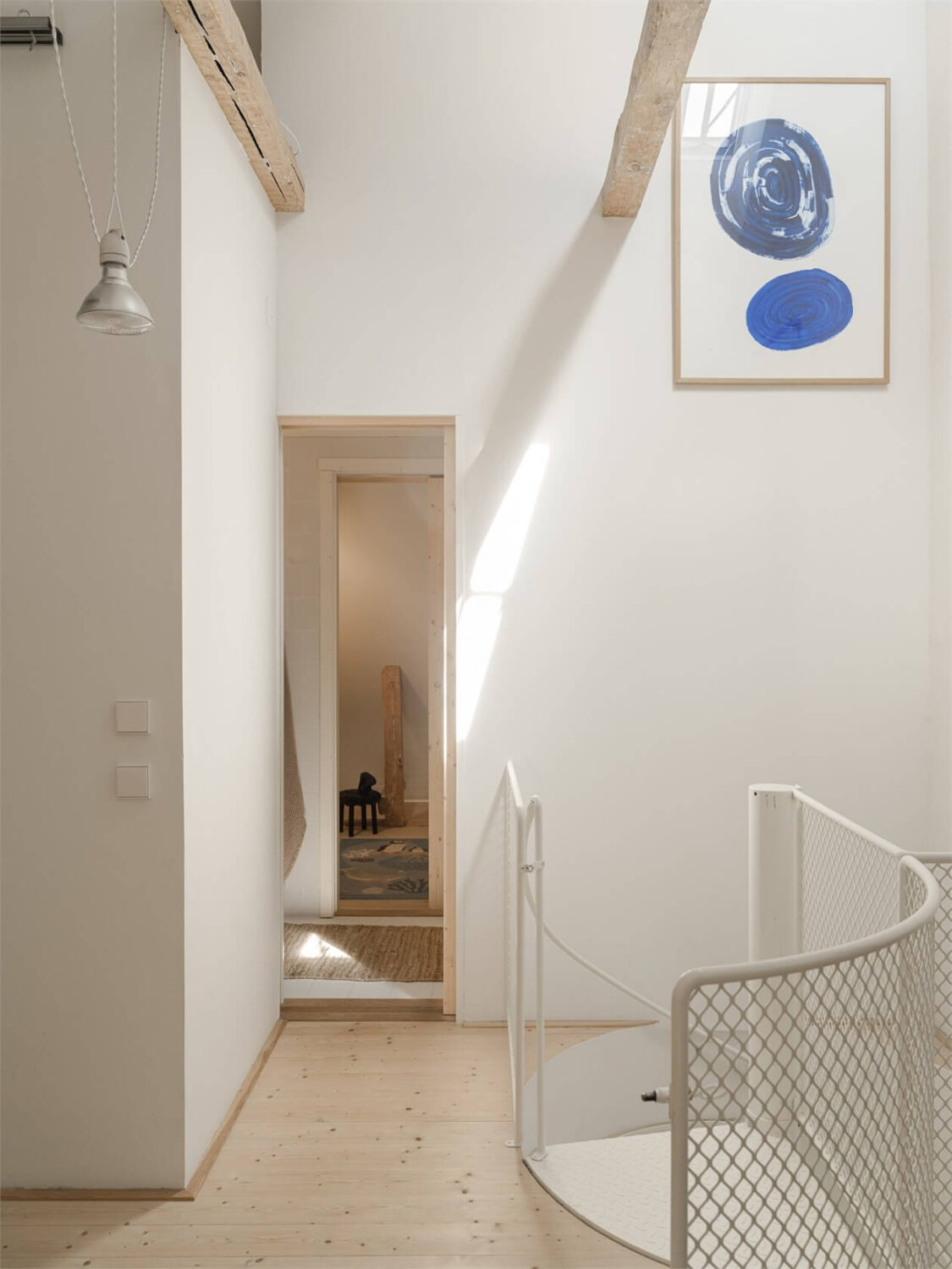 Wooden Details in a Light Duplex Apartment in Sweden 16 landing