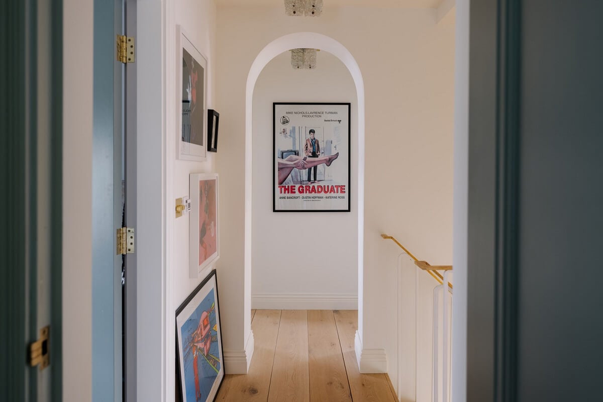 A White English House with a Beautiful Open-Plan Kitchen 13 landing arch doorway