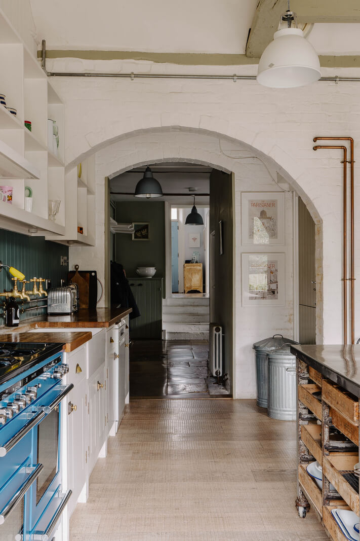 An 18th-Century Historic House with an Amazing Kitchen 5 large kitchen with arched doorway