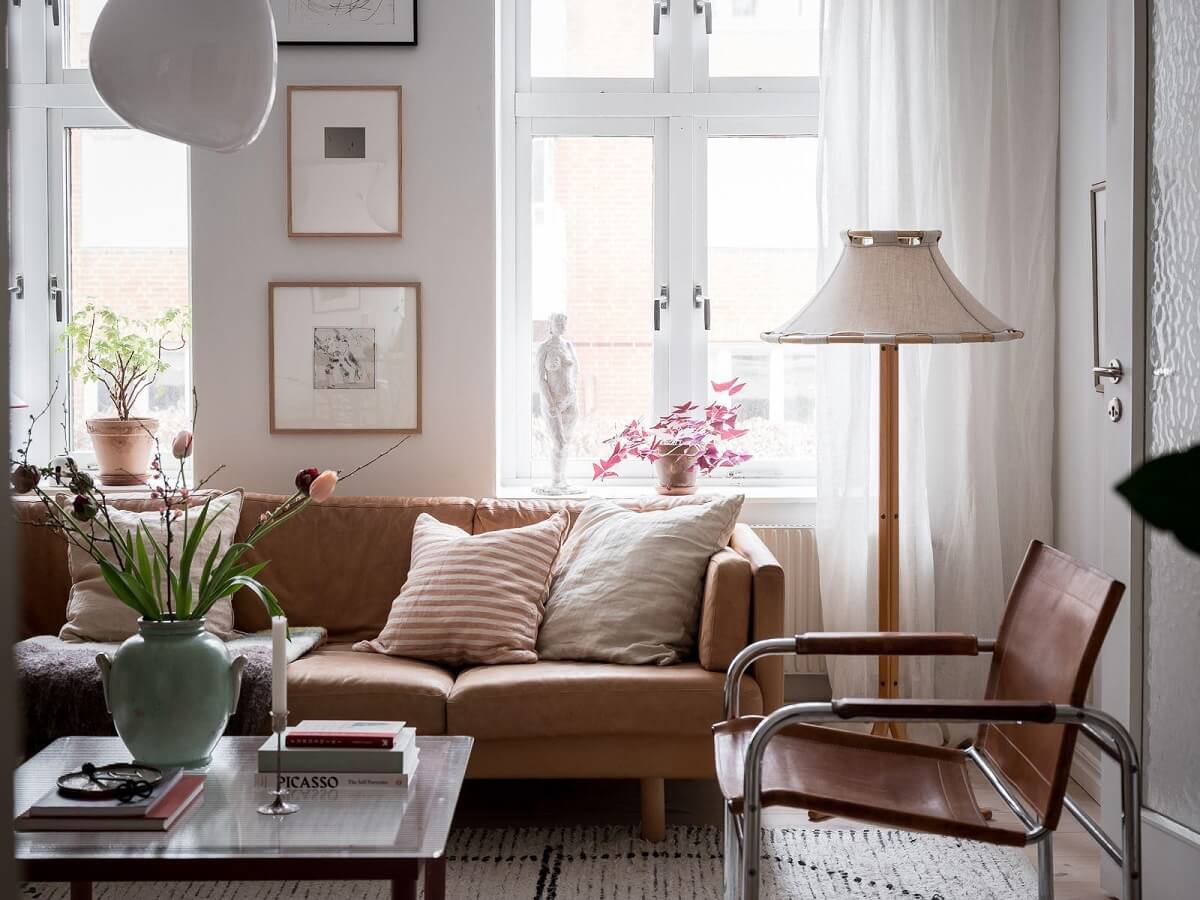 A Light Two Bedroom Apartment in Gothenburg 6 leather sofa scandi living room