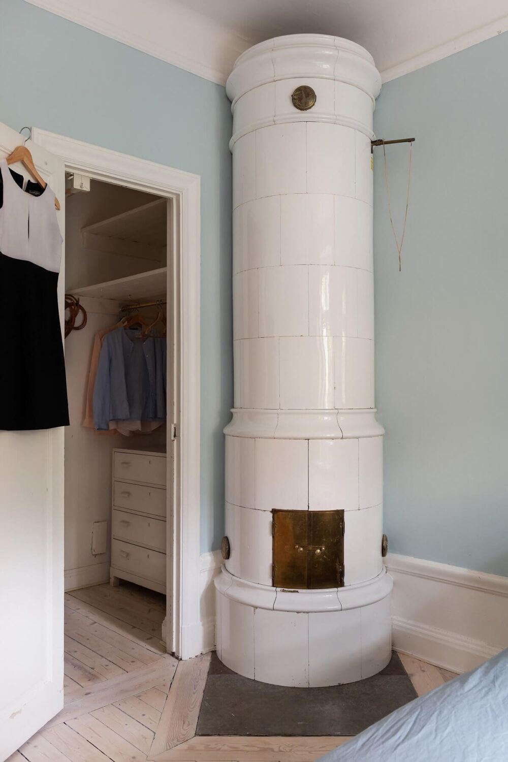 A Swedish Apartment with a Yellow Kitchen 17 light blue bedroom fireplace