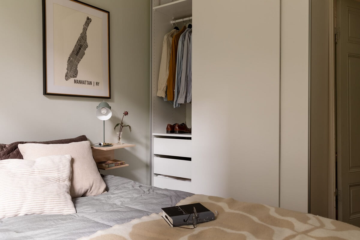 A Swedish Duplex with a Unique Wood and Pastel Colored Kitchen 17 light gray bedroom with wardrobes