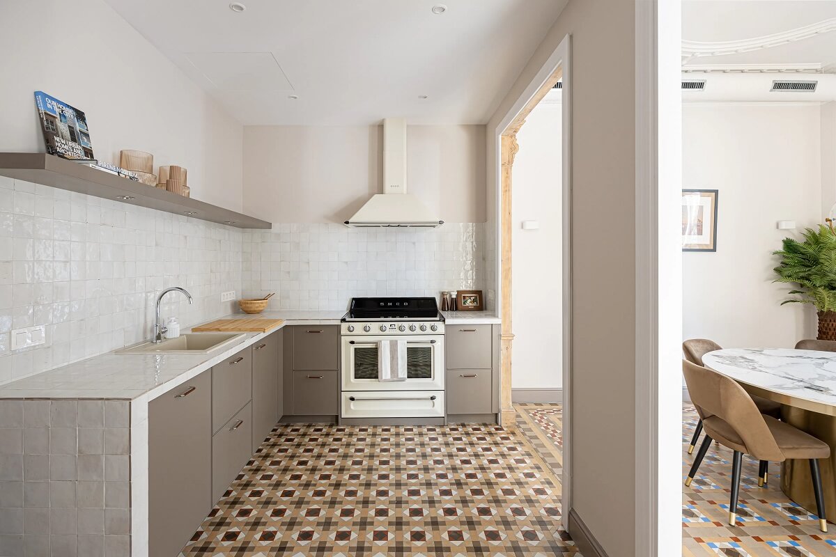 A Renovated Modernist Apartment in Barcelona 9 light gray kitchen
