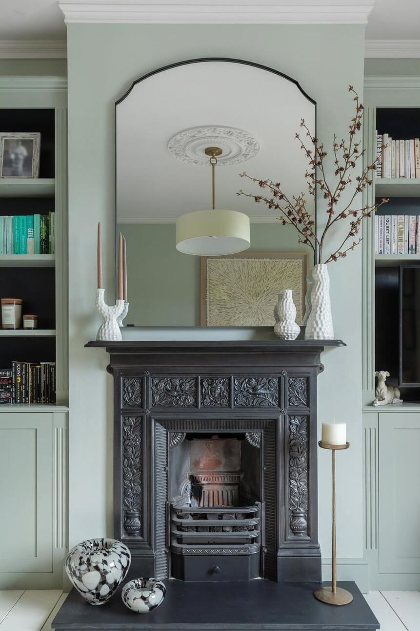 A Victorian House with a Blue deVOL Kitchen 10 light gray living room with black fireplace
