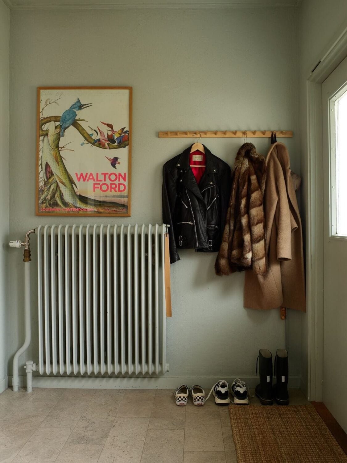 A Charming School Conversion in Sweden 13 light green hallway