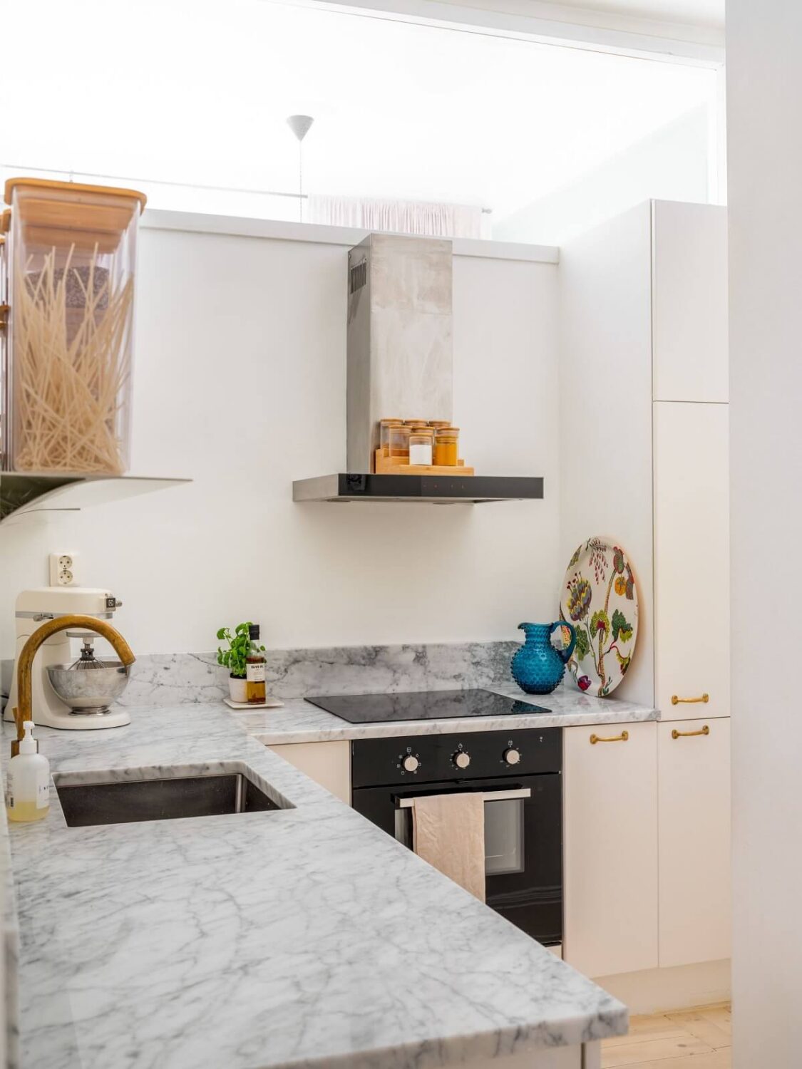 A Small, Tastefully Renovated Apartment in Stockholm 10 light kitchen