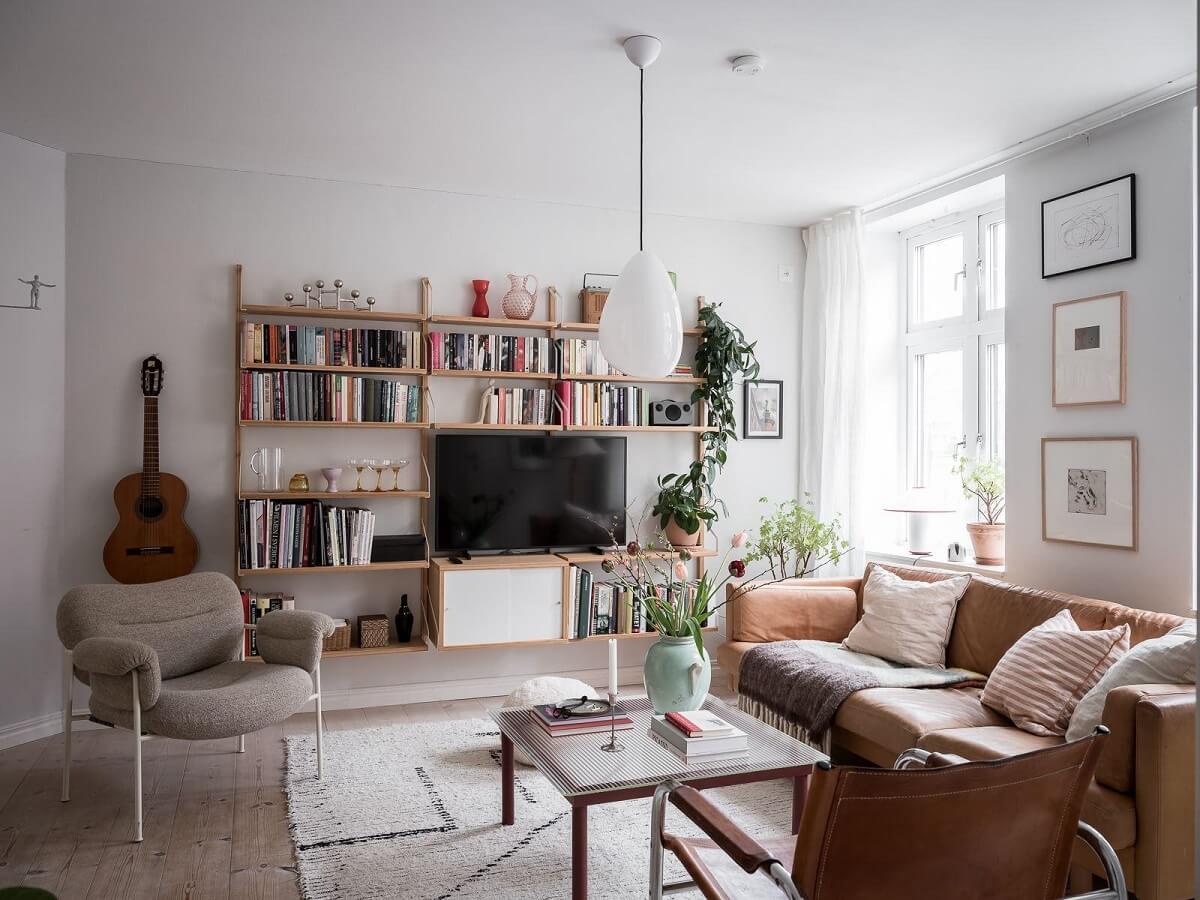 A Light Two Bedroom Apartment in Gothenburg 4 light living room with bookshelves