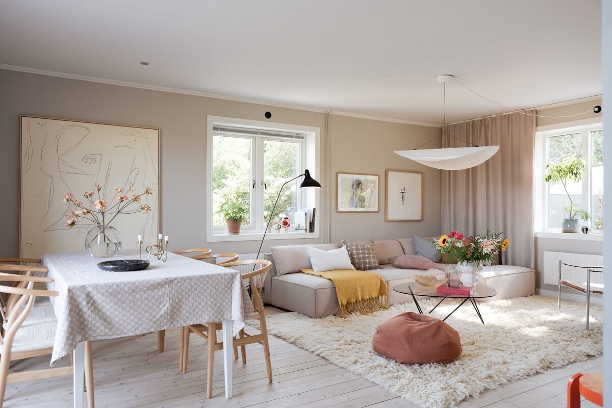 A Pink Swedish House with a Lovely Garden 4 light living room with large rug