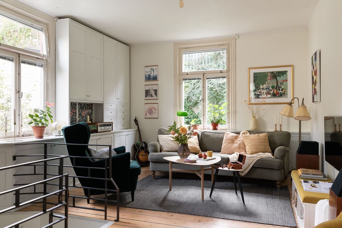 A Swedish Duplex with a Unique Wood and Pastel Colored Kitchen 9 light living room