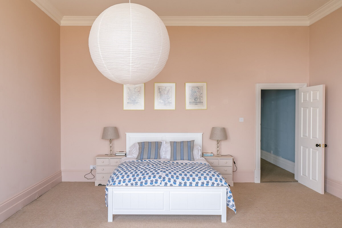 Grand Rooms and Vibrant Colors in an English Country Home 14 light pink bedroom