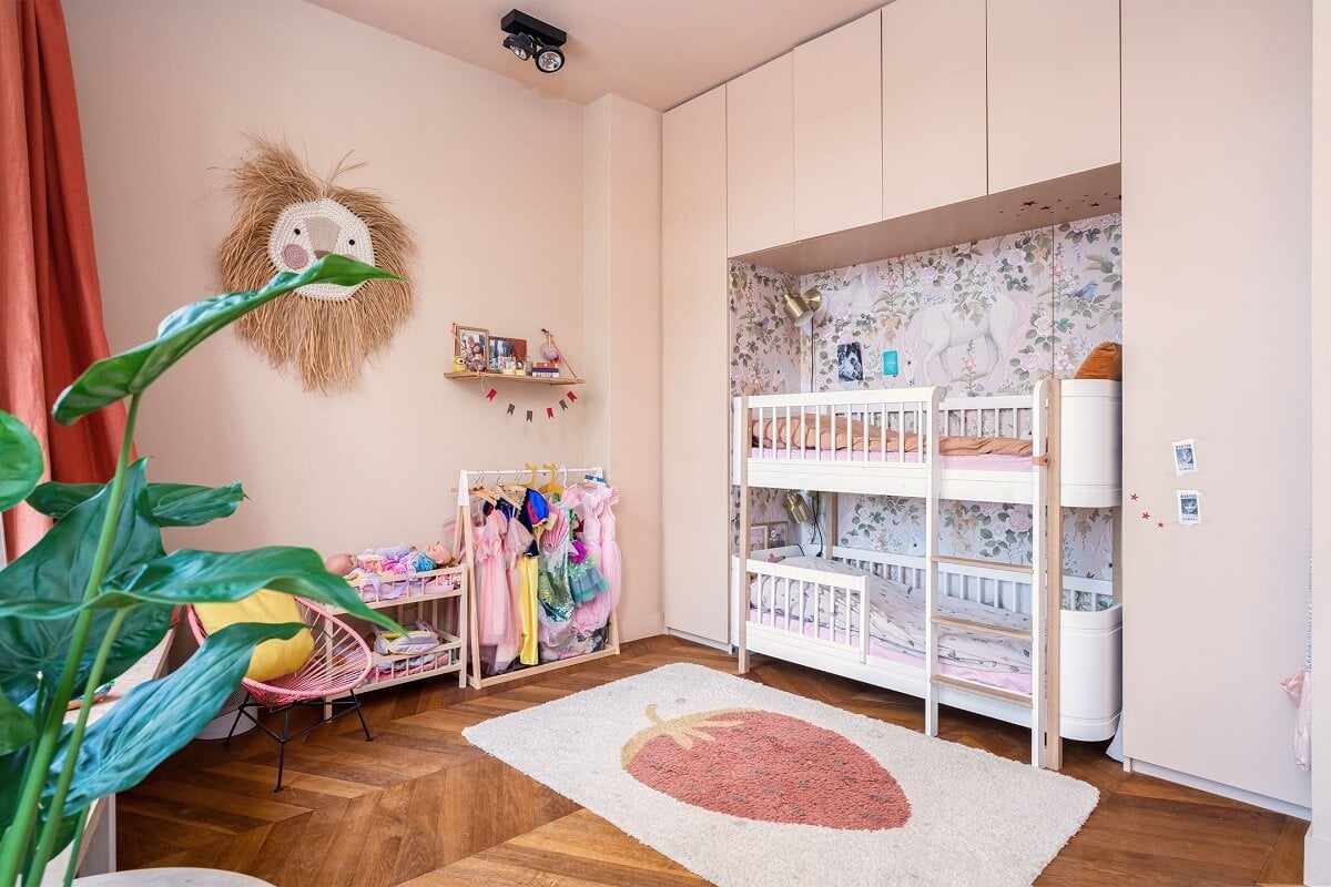 A Colorful Family Home with Open-Plan Spaces in Amsterdam 20 light pink children room with bunk beds and built in wardrobes