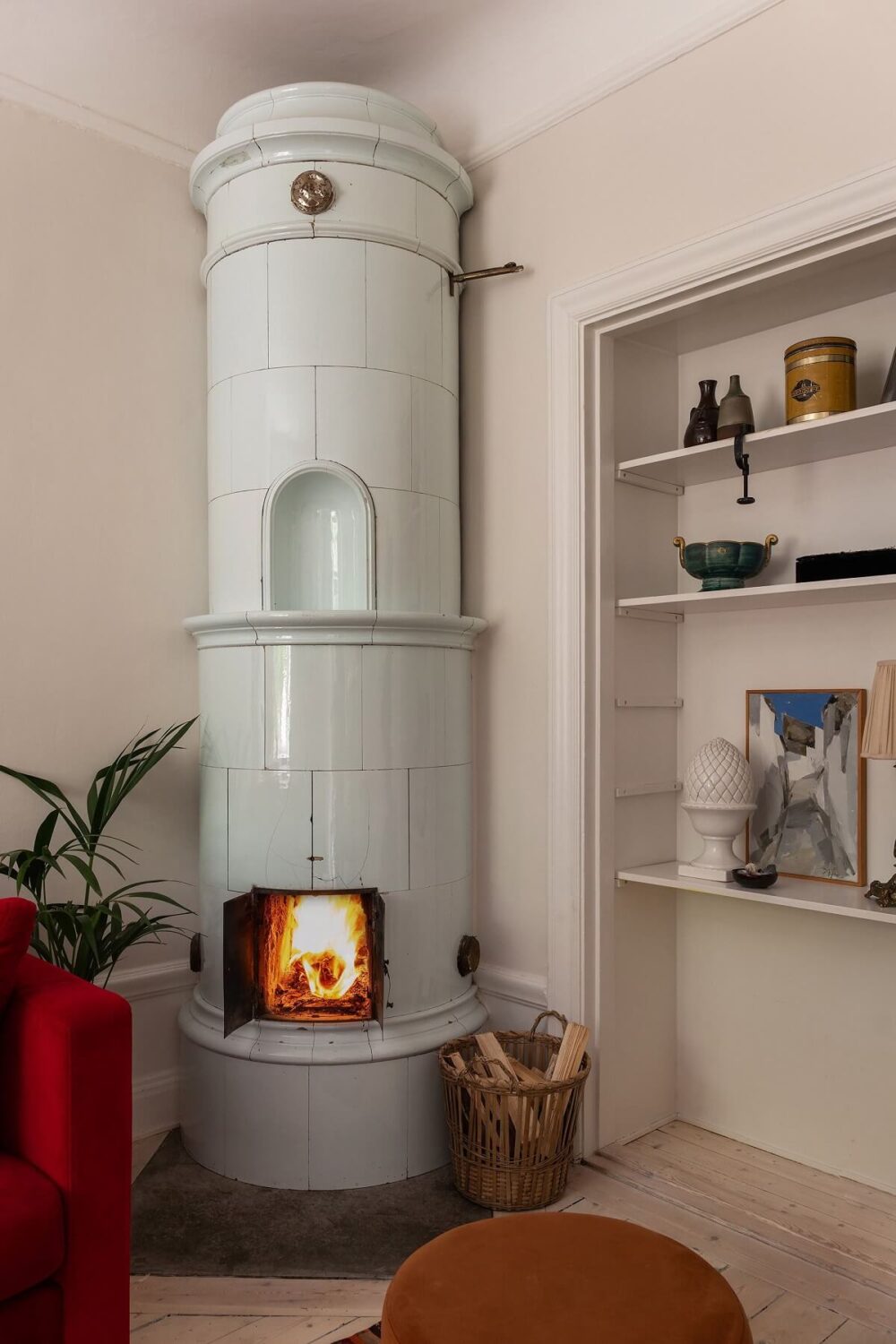 A Swedish Apartment with a Yellow Kitchen 10 living room fireplace