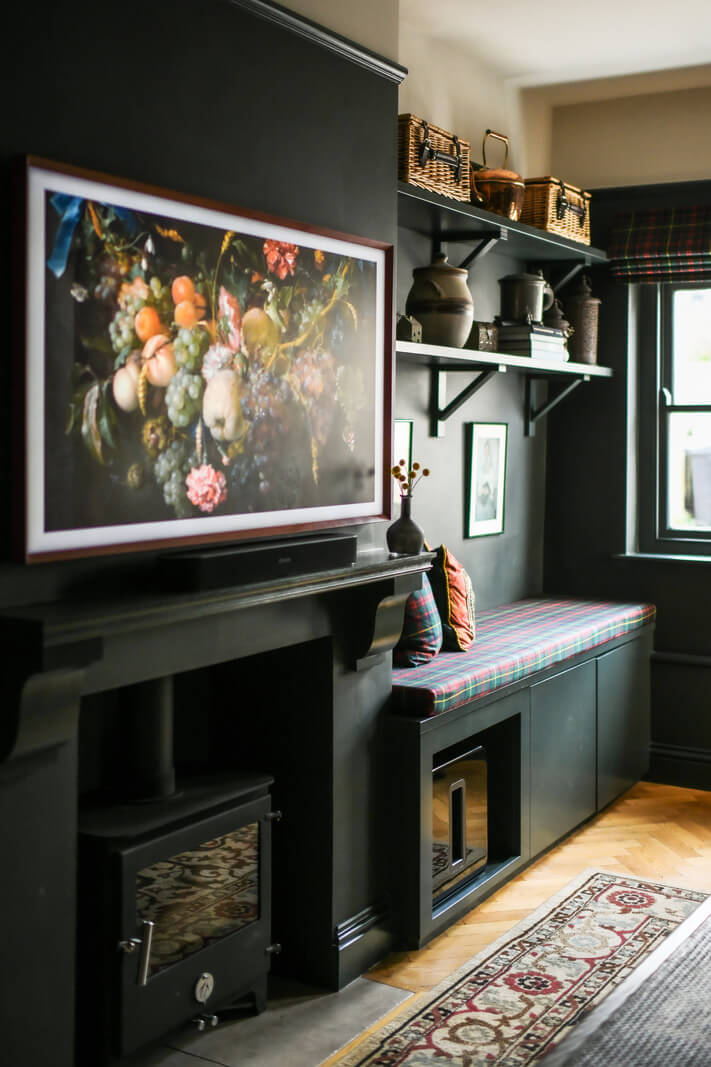 A Rich Color Palette in a Historic English Home 10 living room fireplace and bench