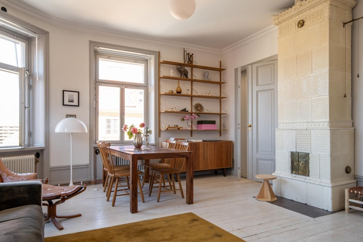 A Corner Apartment with an Industrial Style Kitchen 15 living room white fireplace