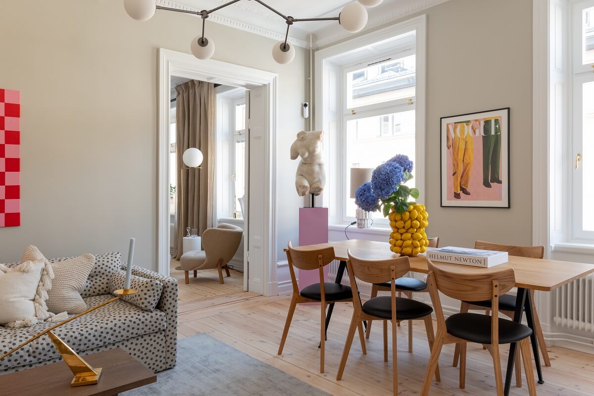 A Light Renovated Apartment in Stockholm 3 living room with bold color accents
