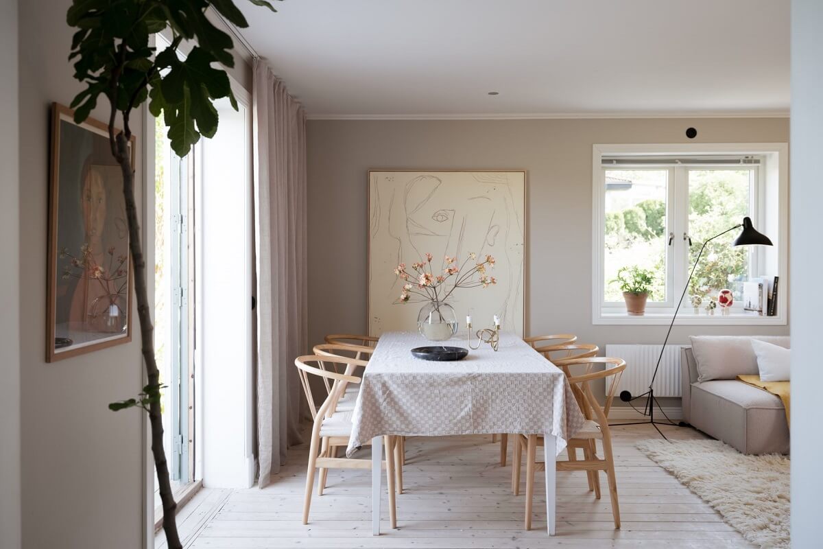 A Pink Swedish House with a Lovely Garden 5 living room with dining table