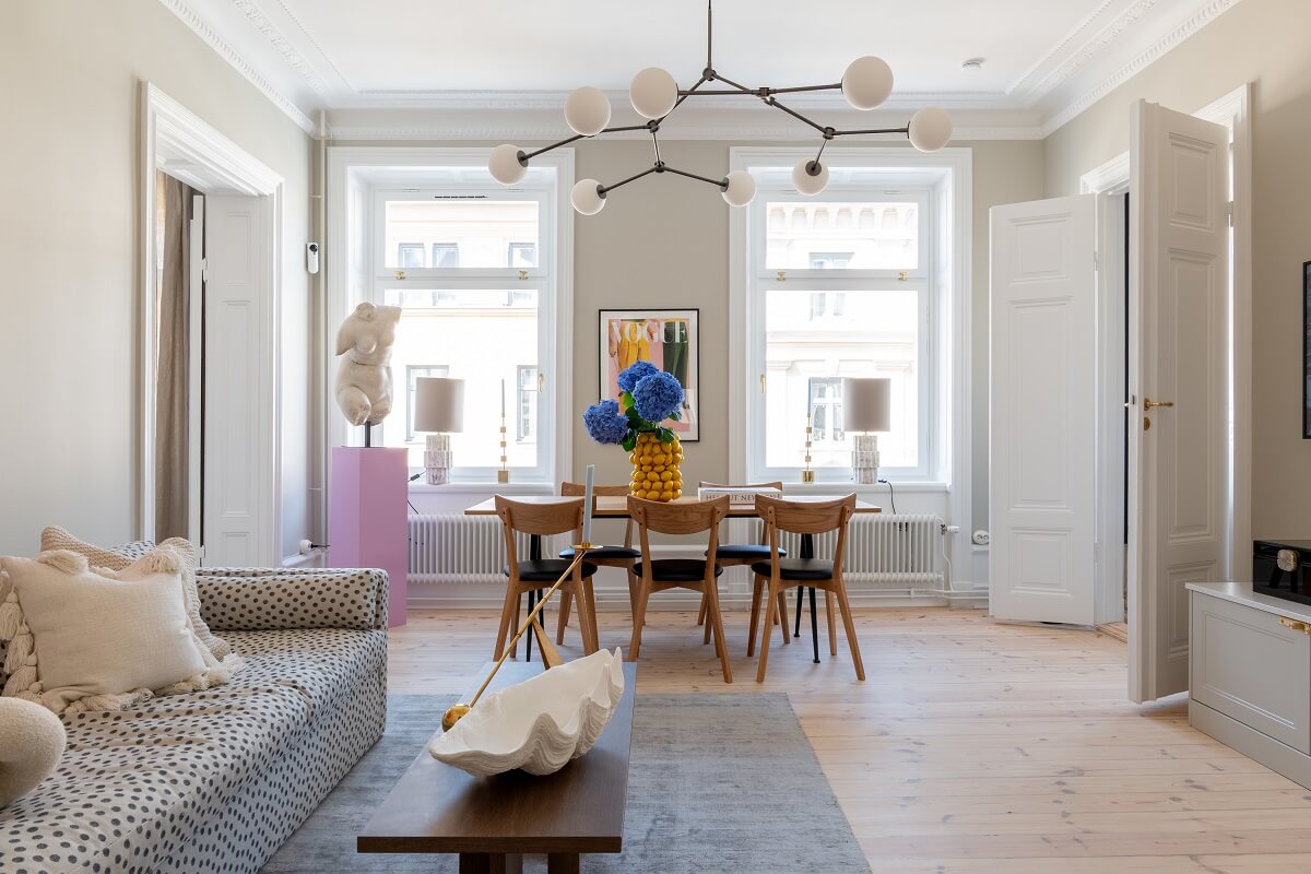 A Light Renovated Apartment in Stockholm 1 living room with dotted sofa