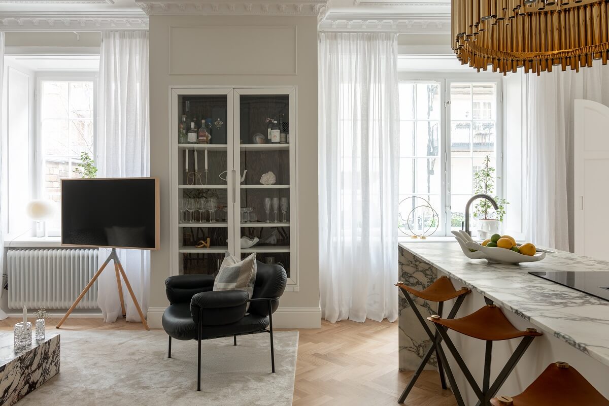 A Classic Look for a Swedish Apartment 5 living space with built in glass cabinets