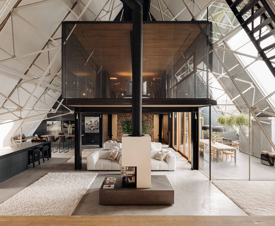 A Luxurious Loft in a Former Amsterdam Church Building 1 loft apartment pitched ceiling netherlands