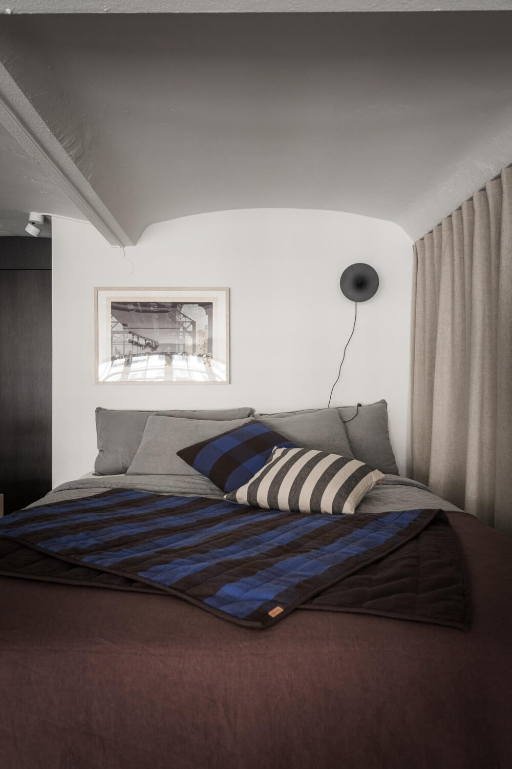 A Monochrome Loft with High Ceilings and Art 32 loft bedroom
