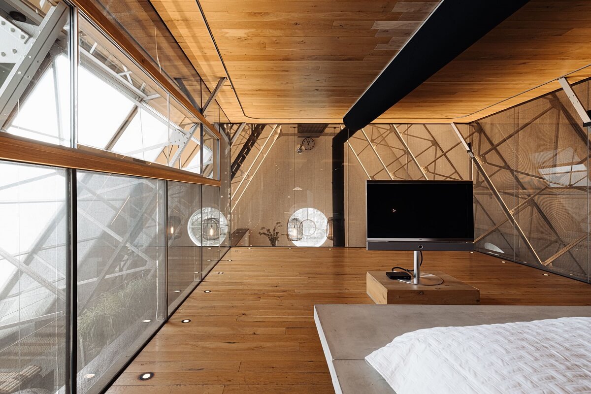 A Luxurious Loft in a Former Amsterdam Church Building 7 loft bedroom glass wall