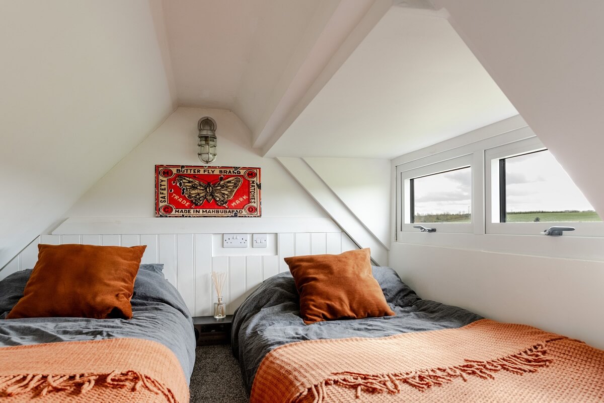 A Tiny Off-Grid House in the English Countryside 8 loft-bedroom-tiny-house