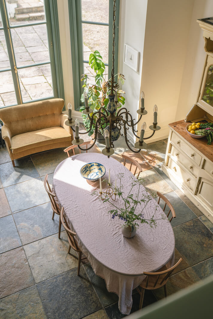 Grand Rooms and Vibrant Colors in an English Country Home 11 loft view of dining table