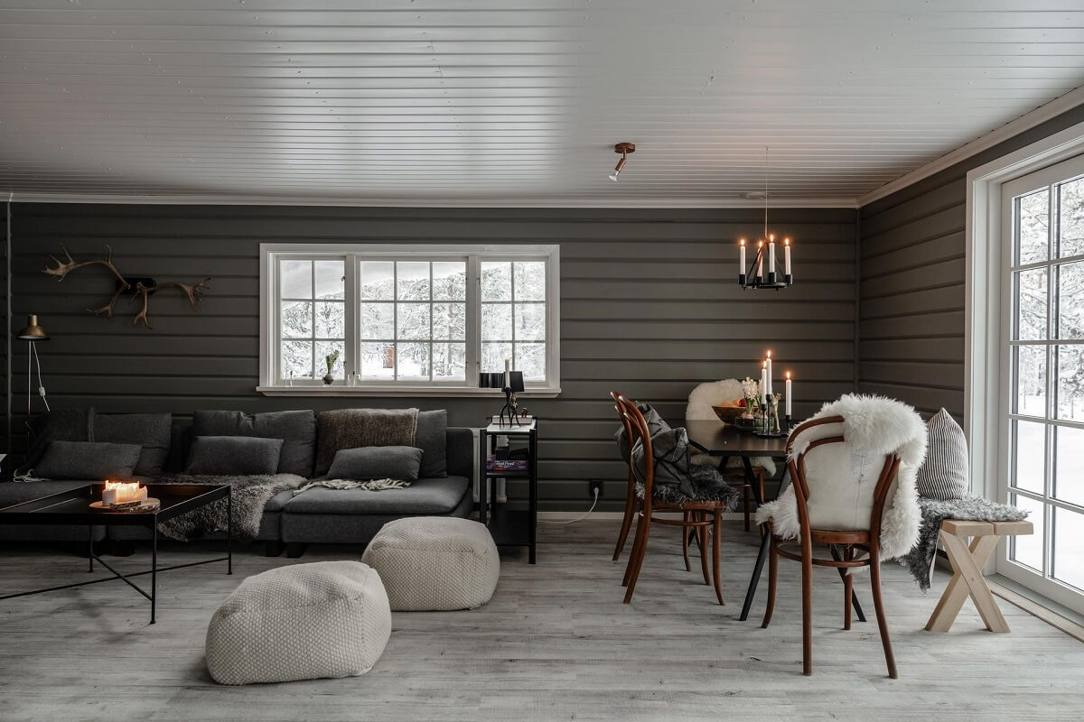 A Gray Swedish Log House Decorated for Christmas 4 log house living room