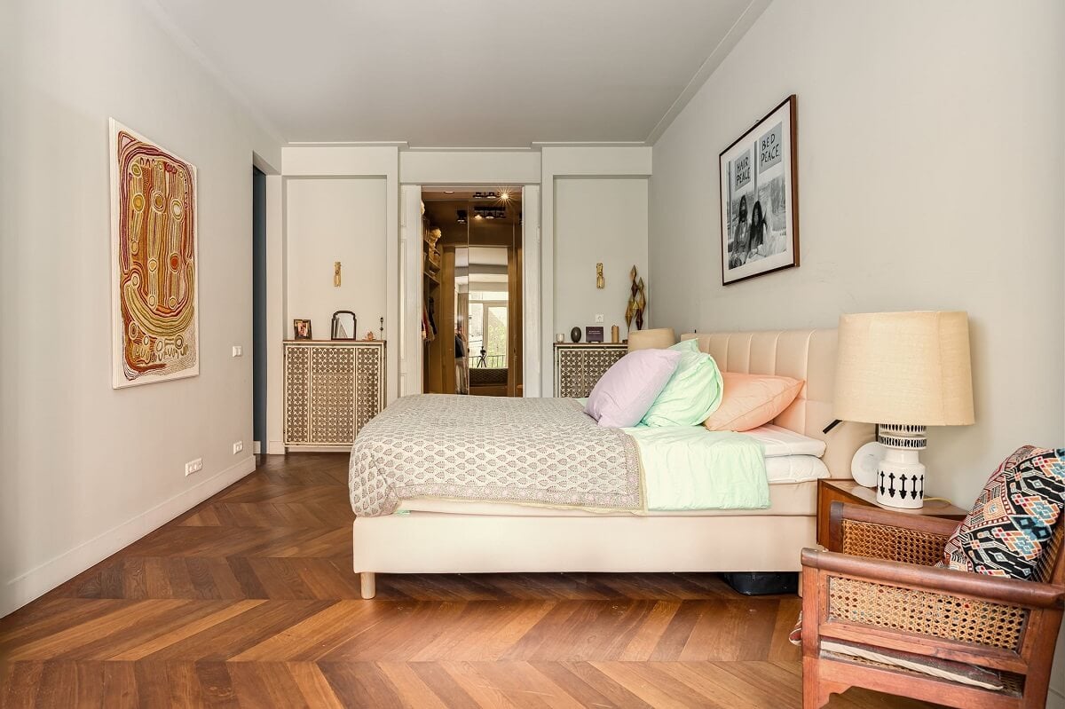 A Colorful Family Home with Open-Plan Spaces in Amsterdam 14 master bedroom with chevron floor