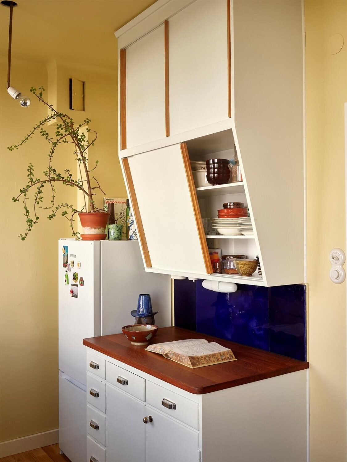 A Swedish Apartment with a Restored Original Kitchen 10 midcentury kitchen cabinets