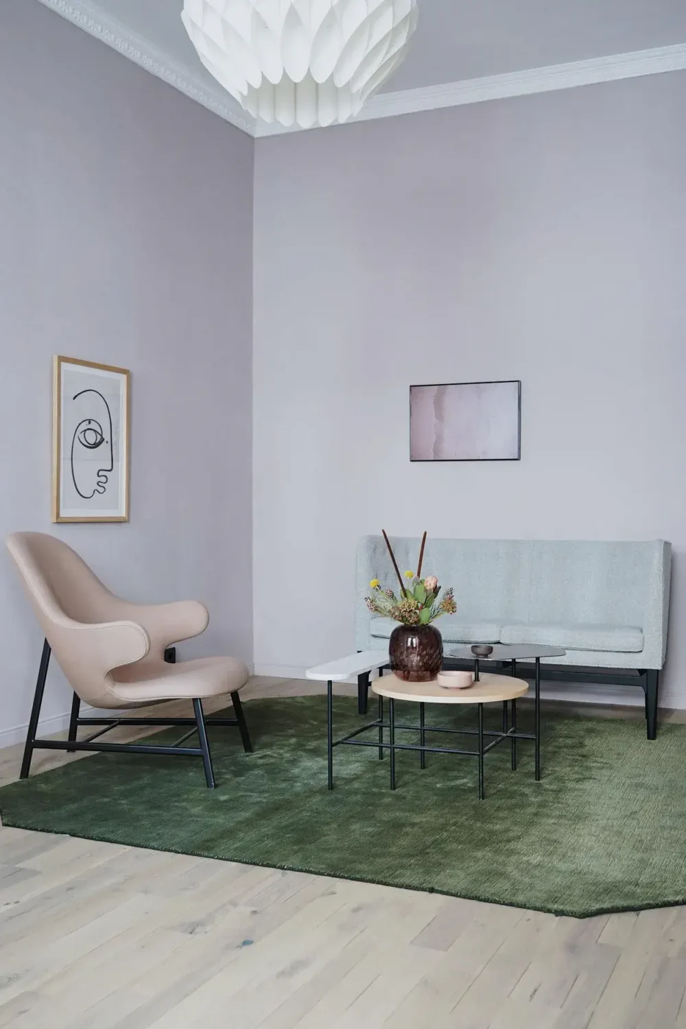 A Blue Kitchen in a Modern Design Apartment in Berlin 4 minimalistic living room with green rug