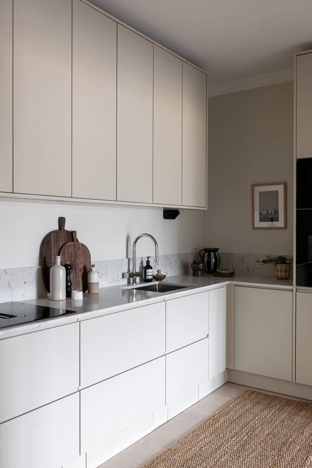 A Stylish Renovated Stockholm Apartment with Built-In Storage 7 minimalistic white kitchen