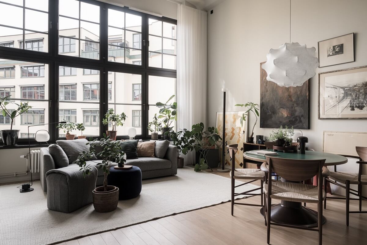 A Monochrome Loft with High Ceilings and Art 1 monochrome loft living space with large windows