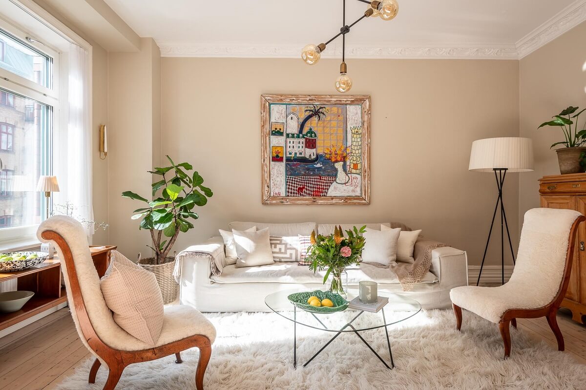 A Turn of the Century Apartment with a Green Kitchen 4 natural light in scandi living room with beige walls nordoom