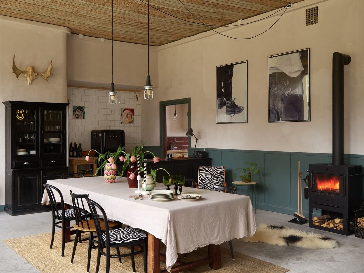A Charming School Conversion in Sweden 1 open plan kitchen dining table in school conversion