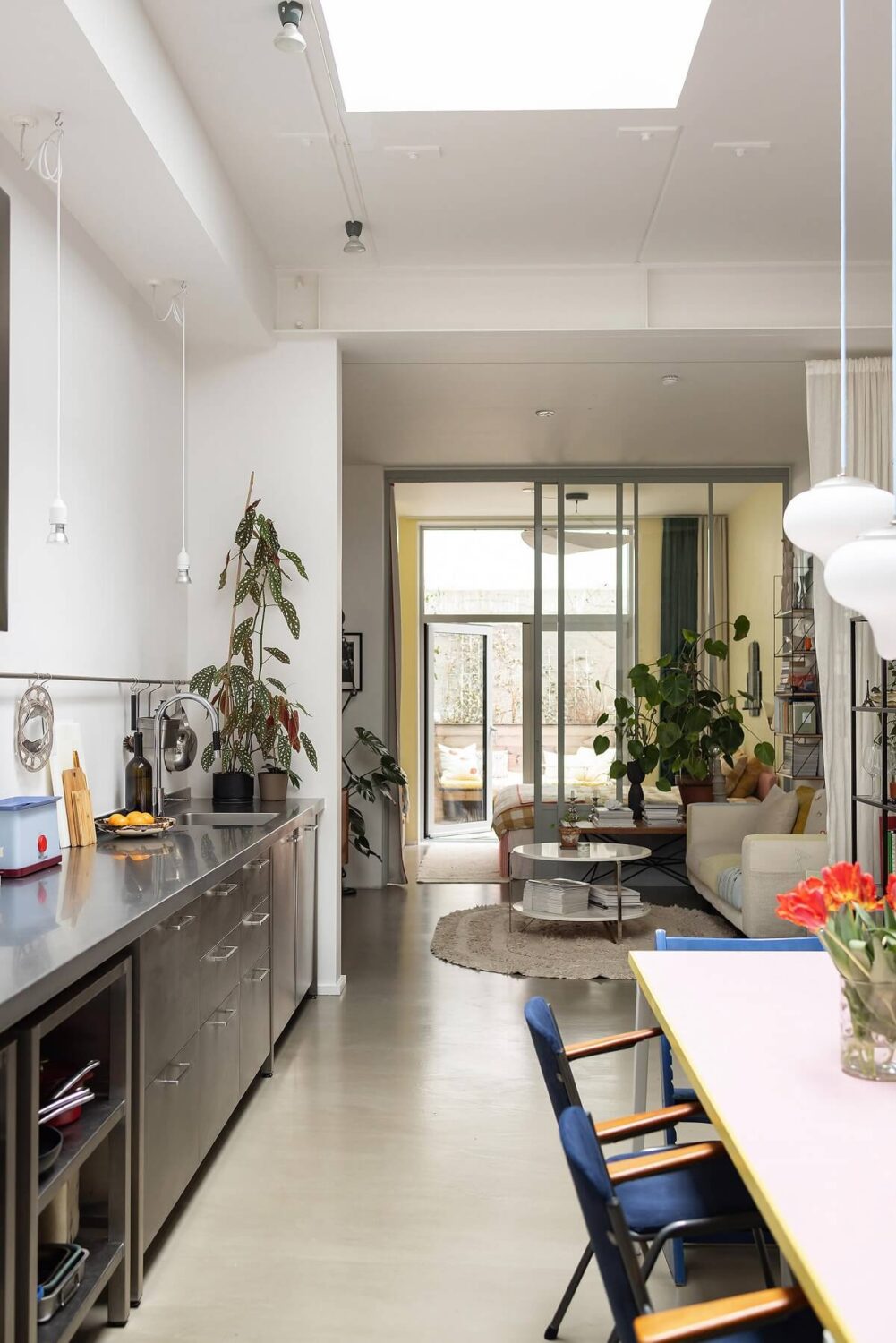 A Unique Basement Apartment in Stockholm 15 open plan living space with skylight