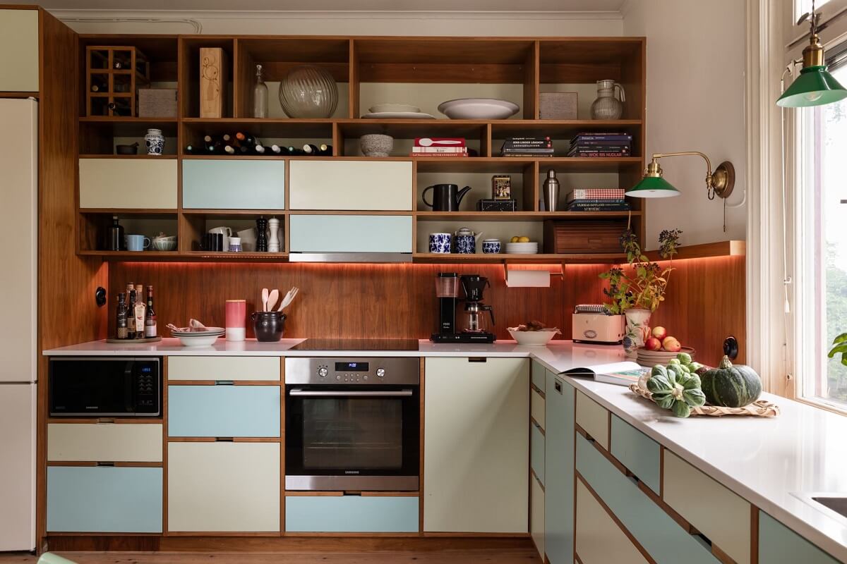A Swedish Duplex with a Unique Wood and Pastel Colored Kitchen 4 open upper cabinets and pastel lower cupboards
