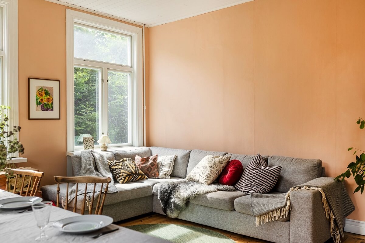 A Historic Swedish Country House with a Beautiful Garden 4 orange pink walls living room