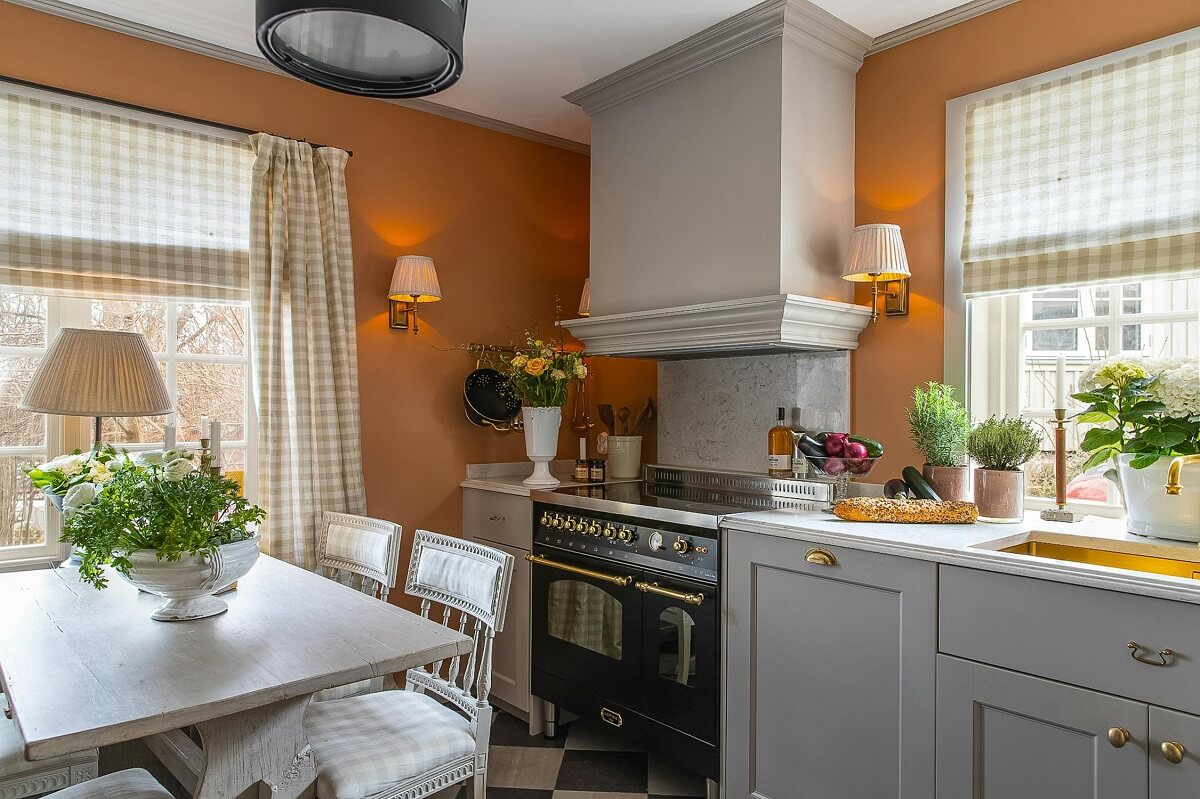 A Classic and Luxurious Lakeside Home in Sweden 13 orange wall kitchen luxurious summer house sweden nordroom