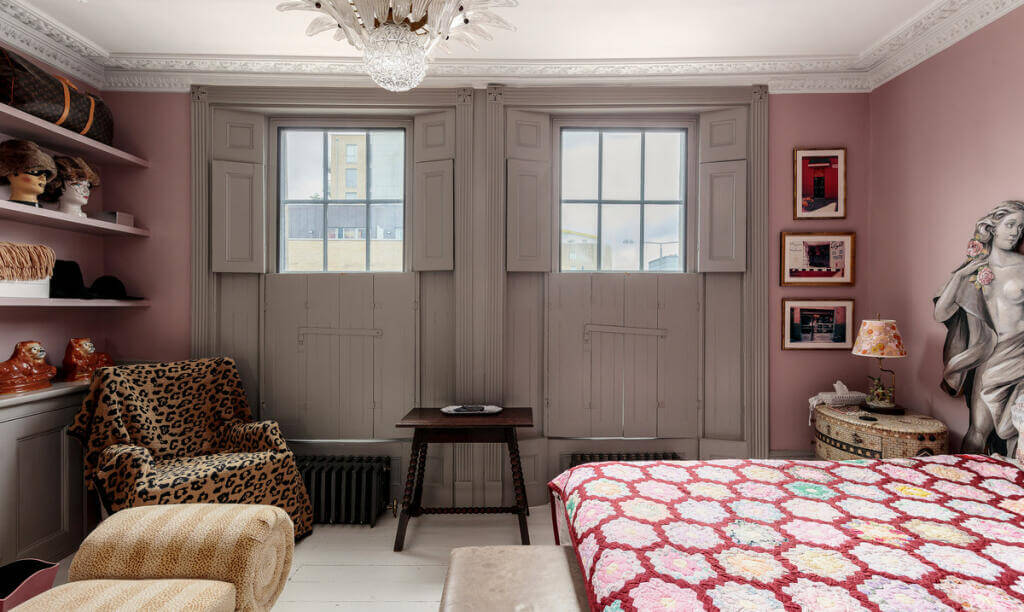 Unique Color Combinations and Design in a London Townhouse 16 pink bedroom with high windows with shutters