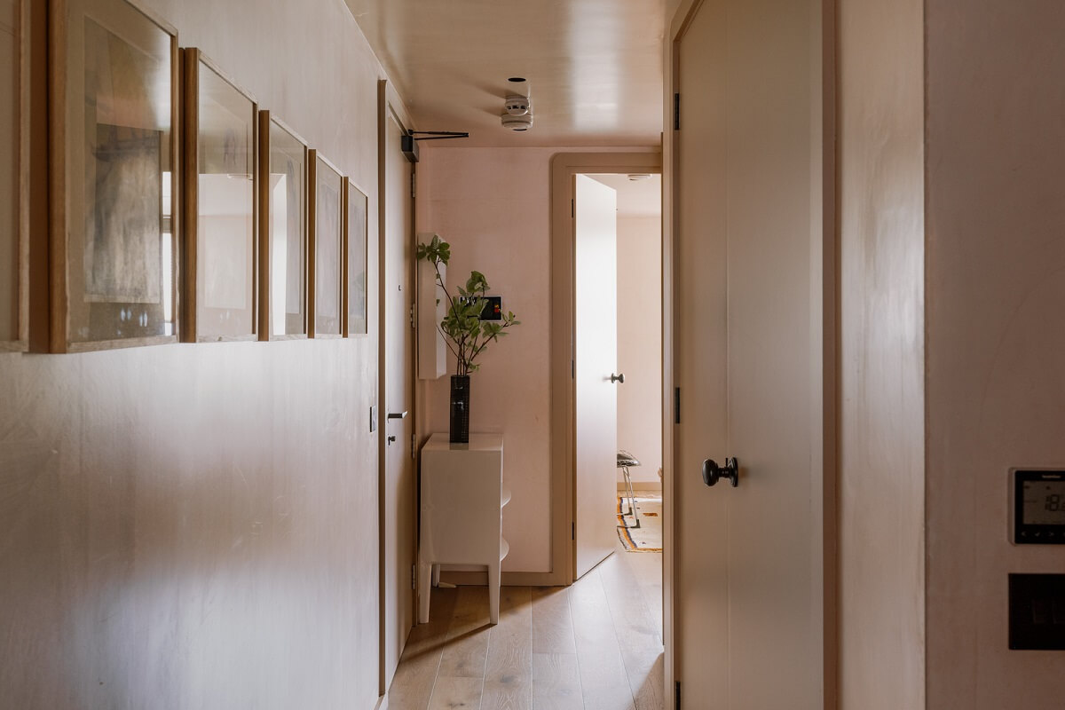 Warm Color Tones in a London Apartment with a Garden 13 pink hallway
