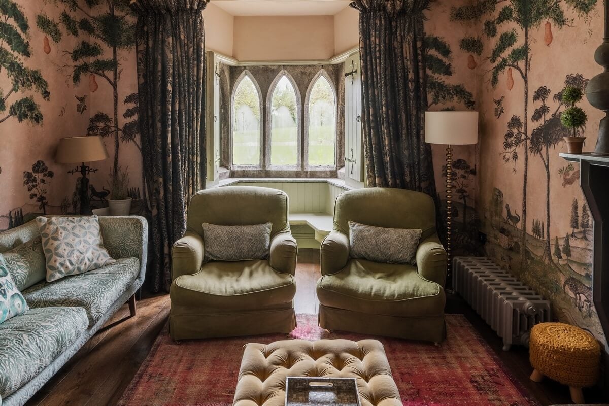 A Charming Gothic-Style Home with Original Details 4 pink house of hackney wallpaper and gothic windows nordroom