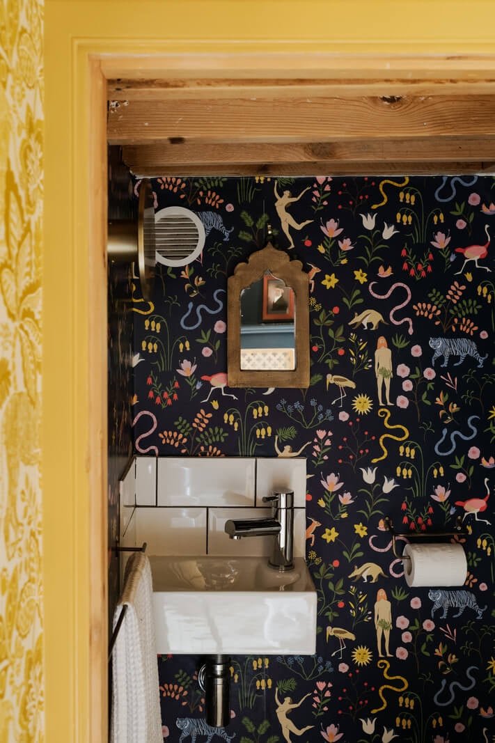 A Rich Color Palette in a Historic English Home 14 powder room garden of eden wallpaper nordroom