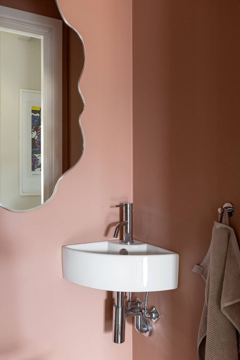 A Stylish Renovated Stockholm Apartment with Built-In Storage 22 powder room with pink walls A Stylish Renovated Stockholm Apartment with Built-In Storage