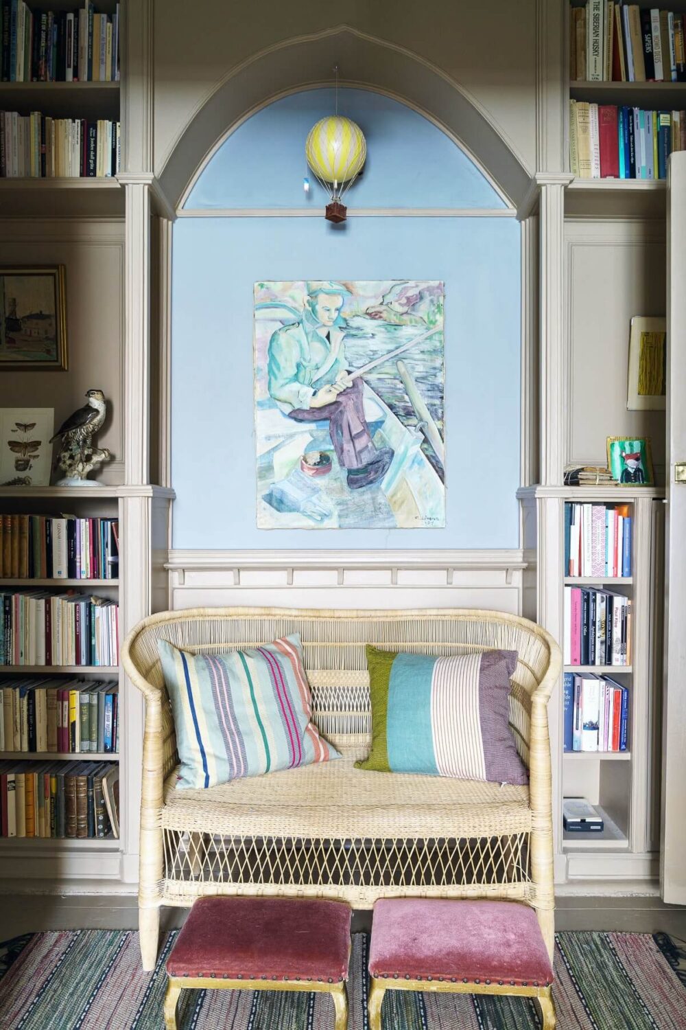 A Unique Courtyard Home in Stockholm 6 reading nook with wall painting A Unique Courtyard Home in Stockholm