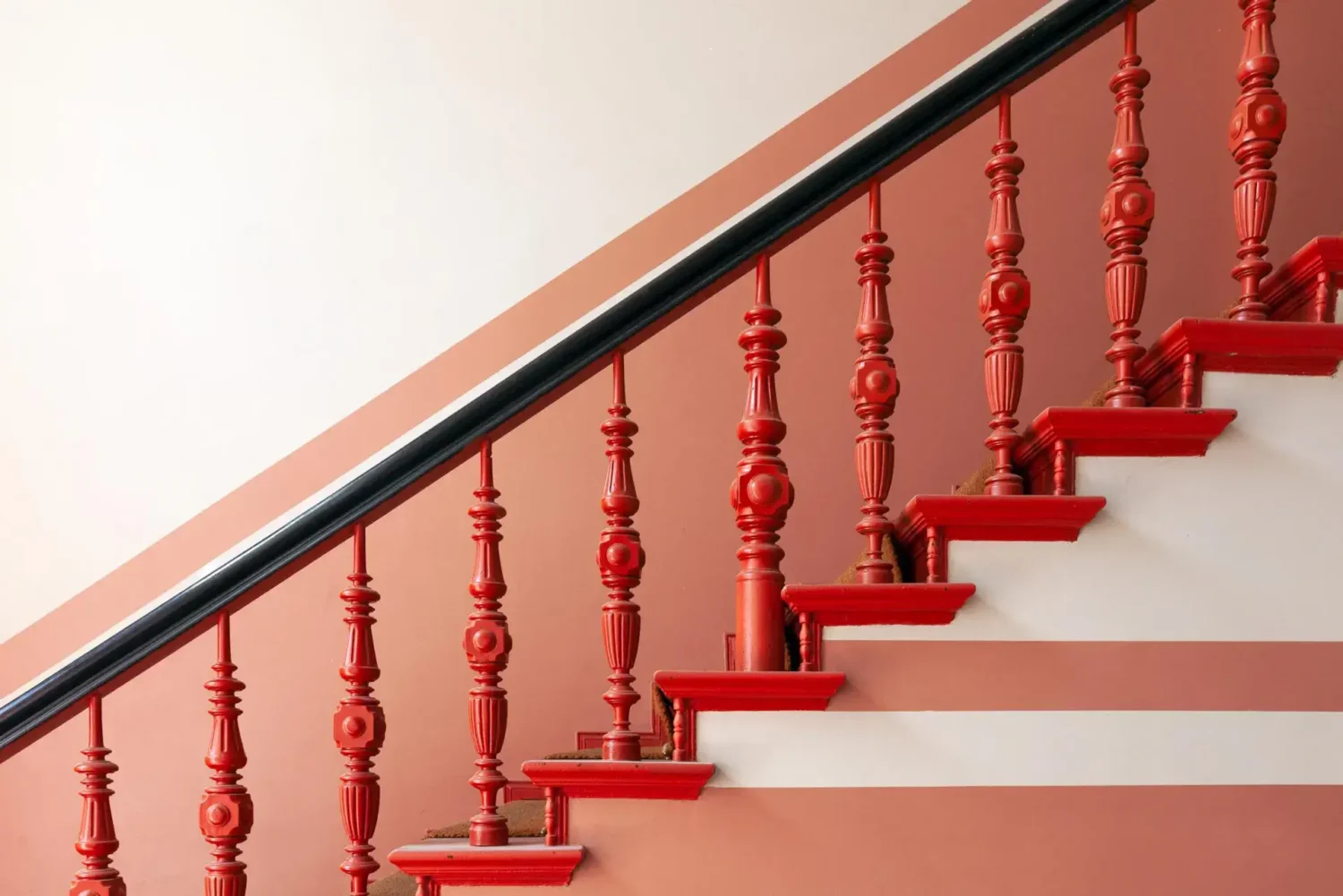 A Blue Kitchen in a Modern Design Apartment in Berlin 11 red and pink stairs
