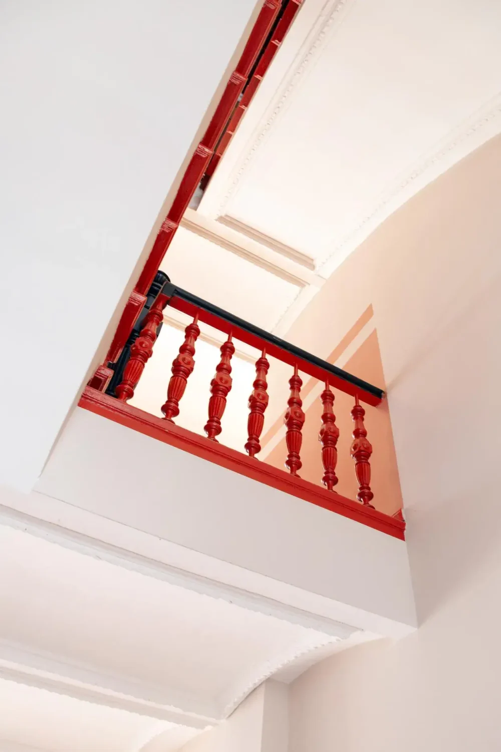 A Blue Kitchen in a Modern Design Apartment in Berlin 10 red stair balustrade